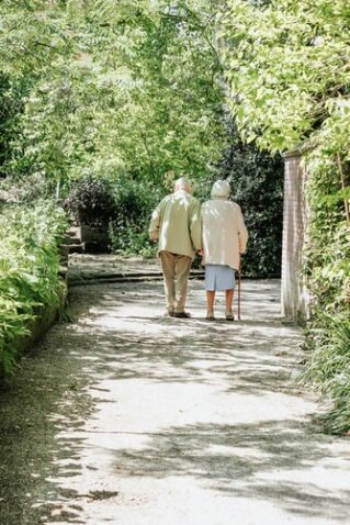 Elderly Couple Walking Slowly - Walking Sticks and Canes