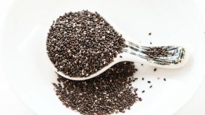 Chia seeds in a white scoop