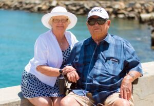 A senior couple at the beach - Retired But Not Tired