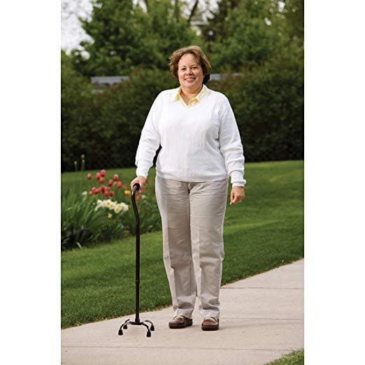 A Woman with a Quad CAREX Bariatric Walking Cane