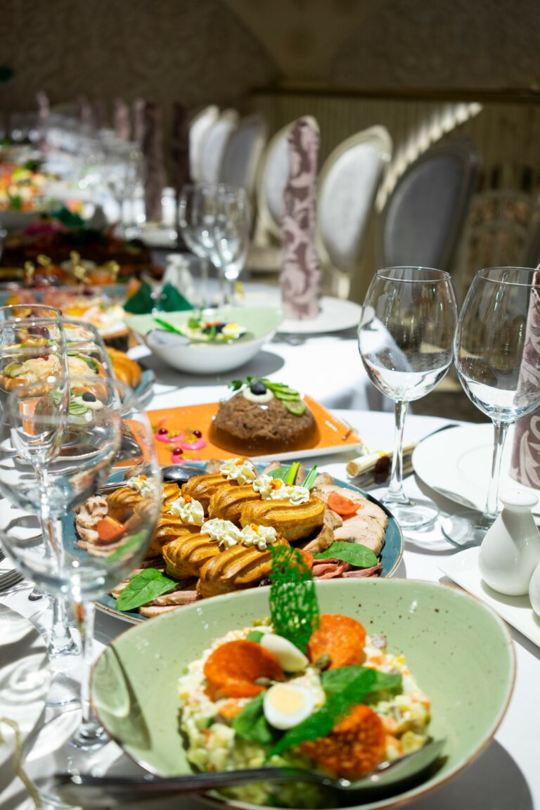 Table set with a lavish spread of food - How to Eat Healthy During the Holidays