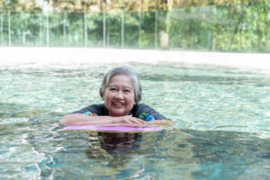 Senior Woman in Swimming Pool -How to Boost the Immune System Quickly