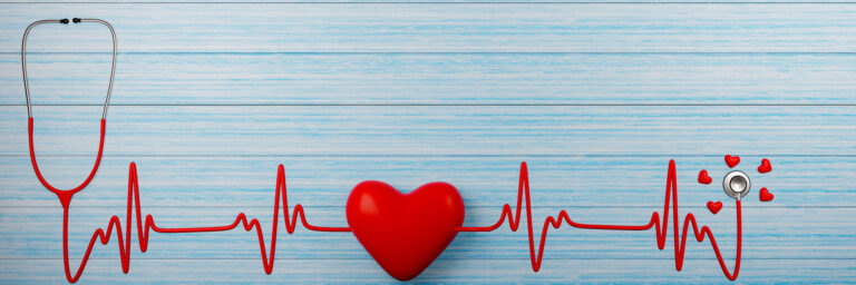 Medical stethoscope and Heart pulse red on a blue plank floor - Why Heart Health is Important for Seniors