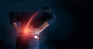 Man-suffering-from-back-pain-with-his-hands-touching-on-lower-back - Relief for Chronic Back Pain