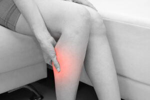 Photo-of-woman-suffering-from-leg-cramp-in-calf - Do Leg Cramps Have a Cure