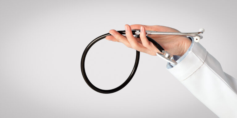 doctors-hand-holding-a-stethoscope- Doctor Visit Checklist